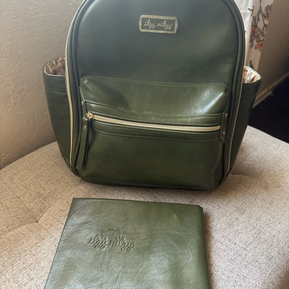 Itsy Ritzy Olive Green Backpack diaper bag with changing...